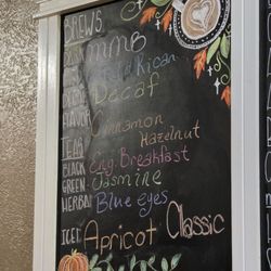 Mill Mountain Coffee & Tea - A menu sign on the wall.