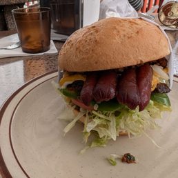 What's better than a burger, a burger with a hot dog. Also gluten free bun options What's better than a burger, a burger with a hot dog. Also gluten free bun options