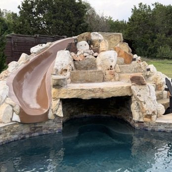 Brenner Pools & Renovations - Beautiful calcium removal and restain of the slide - Pool & Hot Tub Service Near Me