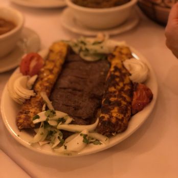 Afghan Grill - a plate of food on a table - Afghan Near Me - New Hyde Park, New York Afghan Grill - a plate of food on a table - Afghan Near Me - New Hyde Park, New York
