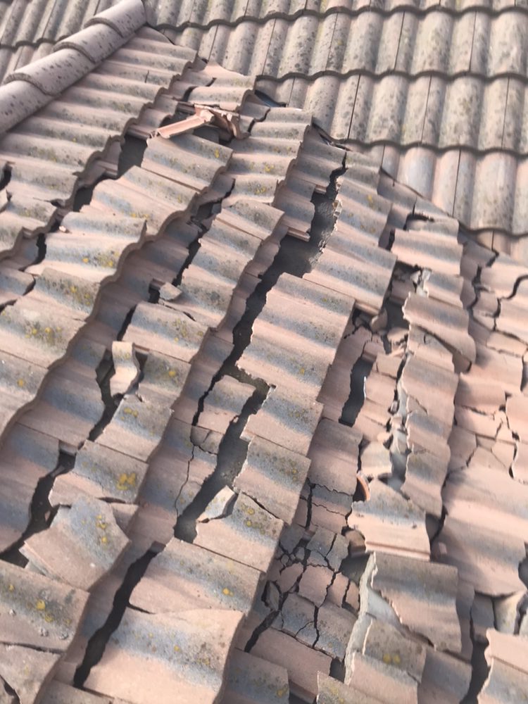 Slide of Century Roofing Company