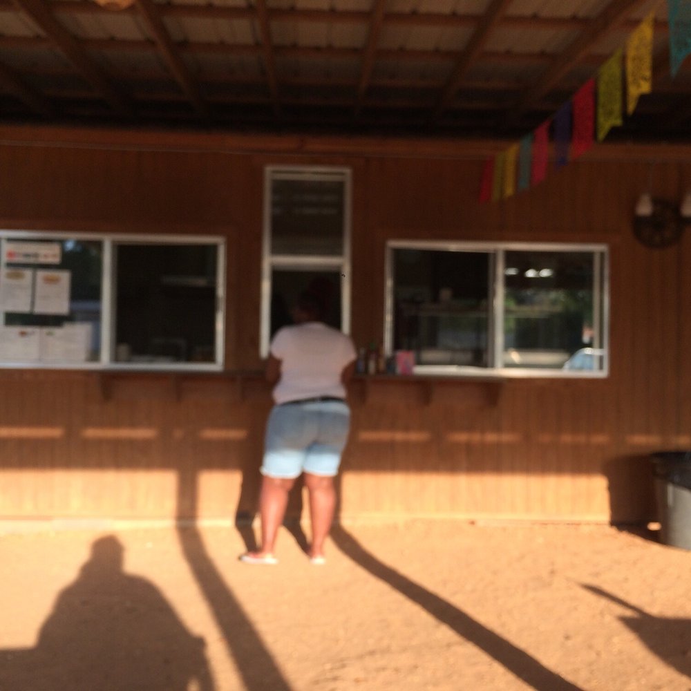La Cabana - two people standing outside - Mexican Near Me - Gloster, Mississippi La Cabana - two people standing outside - Mexican Near Me - Gloster, Mississippi