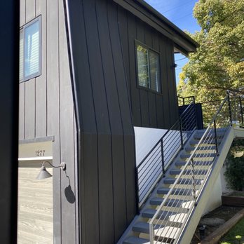 Gutter Flow - AFTER: downspout rerouted to seamlessly blend in with side of house, gutter resloped - Gutter Services Near Me - Simi valley, California