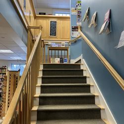The Norwich Bookstore - Stairs leading to children's section, science, nature, and crafting