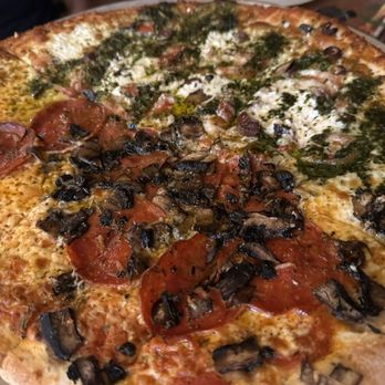 Flatbread Company - Half pepperoni and black olives and half pesto! - Pizza Near Me - Paia, Hawaii Flatbread Company - Half pepperoni and black olives and half pesto! - Pizza Near Me - Paia, Hawaii