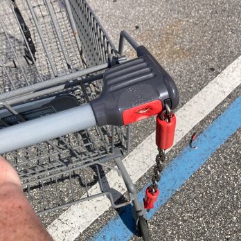 ALDI - a shopping cart with a chain attached to it - Grocery Near Me - Orlando, Florida ALDI - a shopping cart with a chain attached to it - Grocery Near Me - Orlando, Florida
