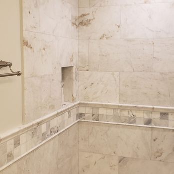 D'Ambra Construction - a bathroom with a marble shower - General Contractors Near Me - Huntington Beach, California D'Ambra Construction - a bathroom with a marble shower - General Contractors Near Me - Huntington Beach, California