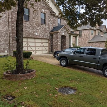 Grass Guru - a truck parked in front of a house - Landscaping Near Me - San Antonio , Texas Grass Guru - a truck parked in front of a house - Landscaping Near Me - San Antonio , Texas
