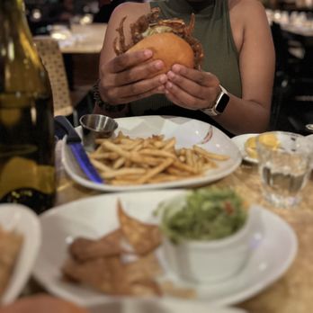Mua - Softshell Crab Po'boy Sandwich Guacamole and Chips - Bars Near Me - Oakland, California Mua - Softshell Crab Po'boy Sandwich Guacamole and Chips - Bars Near Me - Oakland, California