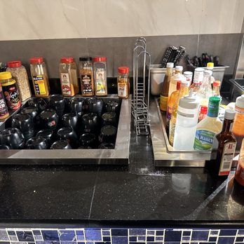KPOT Korean BBQ & Hot Pot - Bowls and seasonings available for the hot pot and KBBQ - Korean Near Me - Norfolk, Virginia