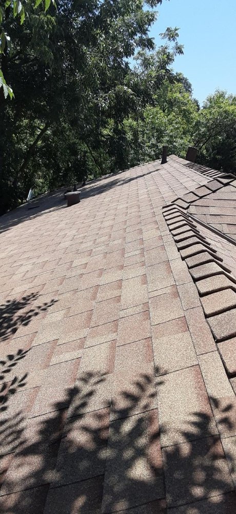 Slide of Century Roofing