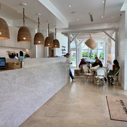 Additional indoor seating and doors leading to the patio. Additional indoor seating and doors leading to the patio.