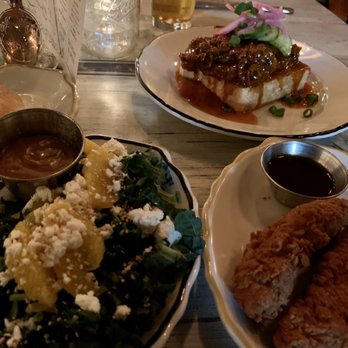 Haberdish - Clockwise: Nashville hot chicken, tenders, kale salad, biscuit - Southern Near Me - Charlotte, North Carolina