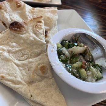 Lavash Mediterranean - Half eaten hot pita with refreshing dip - Mediterranean Near Me - Livermore, California Lavash Mediterranean - Half eaten hot pita with refreshing dip - Mediterranean Near Me - Livermore, California