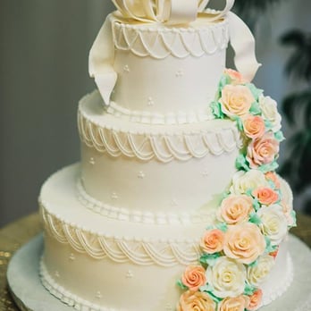 Chantilly Cakes - Cake that I got from Chantilly, with bow on top and flowers not matching wedding colors. - Bakeries Near Me - Largo, Florida