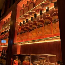 The Bankers Bar - Collection of whiskeys on the wall.