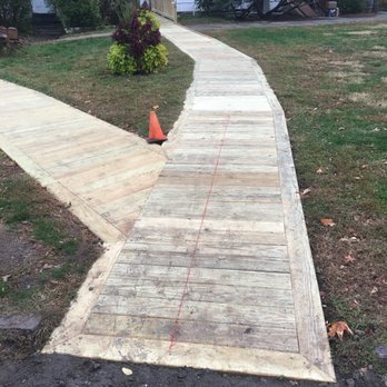 Atlantic Construction & Coatings - a walkway being installed - General Contractors Near Me Atlantic Construction & Coatings - a walkway being installed - General Contractors Near Me