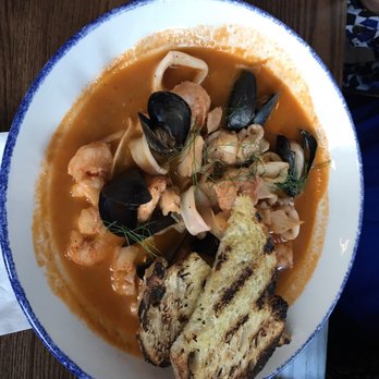 Noco Provisions - Fish stew - Bars Near Me - Grand Rapids, Michigan