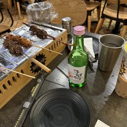 Friendship BBQ - Chicken, Mongolian beef, and lamb skewers with lychee soju and rose milk tea