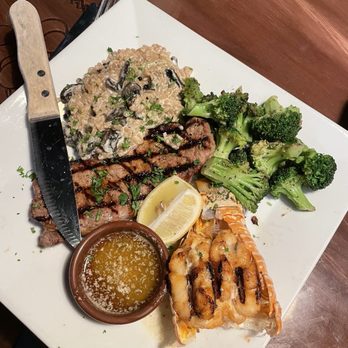 Piloni's Italian Steakhouse - Surf and turf. New York strip and lobster tail with risotto. - Italian Near Me - Brazil, Indiana
