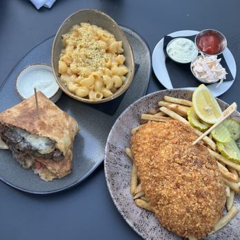 Tavern in the Square - Fish and chips (right) - Sports Bars Near Me - Boston, Massachusetts Tavern in the Square - Fish and chips (right) - Sports Bars Near Me - Boston, Massachusetts