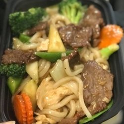 Thai Chili Basil - Udon Garlic: Udon wheat noodle wok-flied with beef and mixed vegetable with garlic pepper sauce