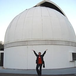 In front of the big telescope, doing my yoga tree pose!