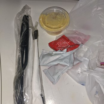 Next Phaze Cafe - Utensils and ketchup and secret sauce - Cafes Near Me - Baltimore, Maryland