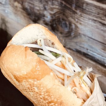 East Borough - Pho baguette $11 beef brisket, thai basil, onions, chili, sriracha hoisin aioli. pho dip. - Vietnamese Near Me - Costa Mesa, California