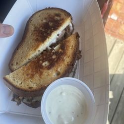 Braised beef grilled cheese on gluten free bread.