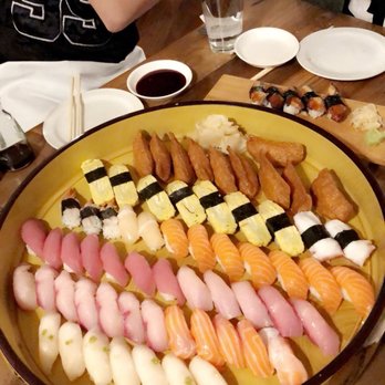 Takohachi Japanese Restaurant - Round 1 of nigiri! Features tuna, yellowtail, yellowtail belly, salmon, salmon belly, ebi, white tuna, tamago, and inari. - Japanese Near Me - Arlington, Virginia Takohachi Japanese Restaurant - Round 1 of nigiri! Features tuna, yellowtail, yellowtail belly, salmon, salmon belly, ebi, white tuna, tamago, and inari. - Japanese Near Me - Arlington, Virginia