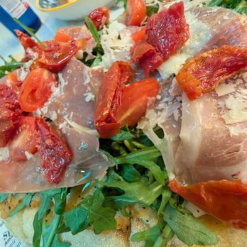 Castanea Sicilian Cafe - Close up of the Prosciutto Crudo e Parmigiano Pinsa - Coffee & Tea Near Me - Beverly Hills, California