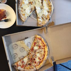 Corbo & Sons - White pie, sausage and tomato pie. There is also a regular cheese pie, not pictured