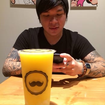Mr Tea Cafe - A handsome wild Rollie and passionfruit and mango smoothie with haupia - Bubble Tea Near Me - Honolulu, Hawaii Mr Tea Cafe - A handsome wild Rollie and passionfruit and mango smoothie with haupia - Bubble Tea Near Me - Honolulu, Hawaii