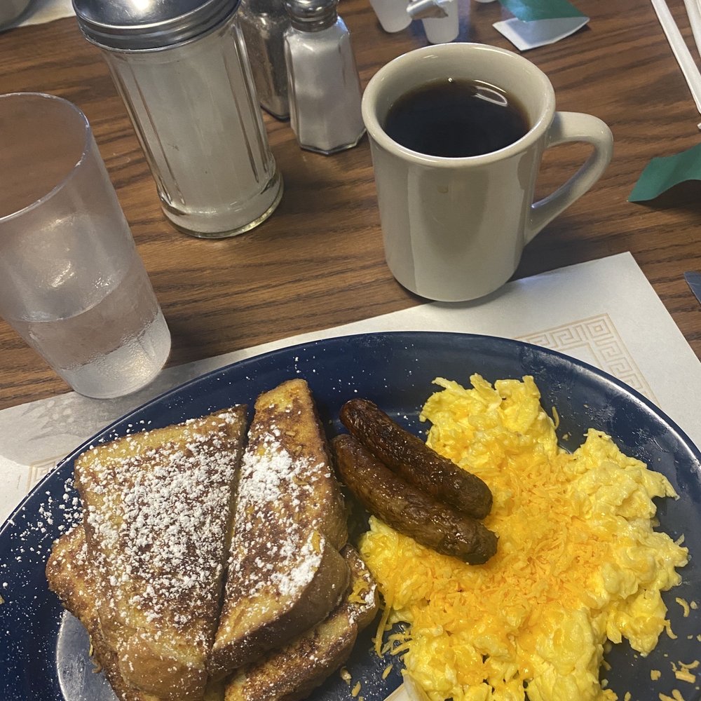 a breakfast of eggs, toast and sausage a breakfast of eggs, toast and sausage