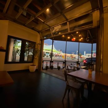 3128 Social House - View of the park on through the open garage door - Gastropubs Near Me - Albuquerque, New Mexico