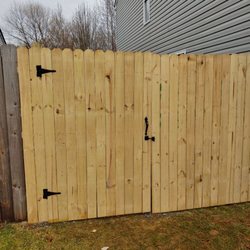 Cole's Lawn Maintenance - Installing fence project
