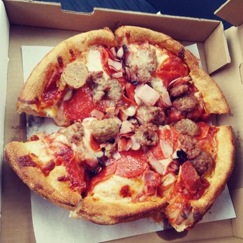 Pizza Booyah - All meat pizza, very flavorful but topping and cutting could use some love too! - Pizza Near Me - Willoughby, Ohio