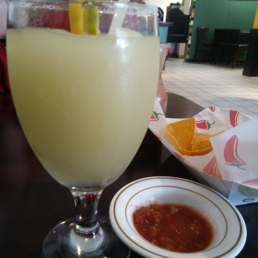 Cazadores - a glass of orange juice and a bowl of salsa - Mexican Near Me - Monticello, Indiana Cazadores - a glass of orange juice and a bowl of salsa - Mexican Near Me - Monticello, Indiana