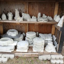 Kaye's Konsignments - Cement stepping stones and garden figures