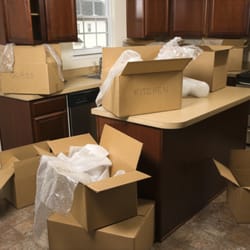 B Five Star Movers - Packing Supplies and Moving Boxes in a Kitchen