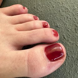 EZ Nails Salon - Bleeding cuticle they painted over