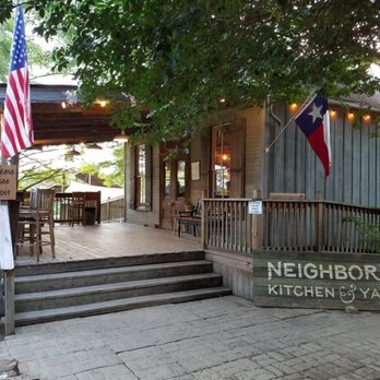 Neighbor's Kitchen & Yard - Front entry. Hidden from the main road a bit. - Pizza Near Me - Bastrop, Texas