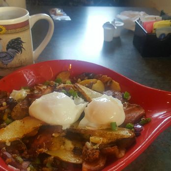 Rutherford's 66 Diner - Chorizo scramble skillet with yolky poached eggs. Oh, and a rooster mug ^_^ - Diners Near Me - Kingman, Arizona Rutherford's 66 Diner - Chorizo scramble skillet with yolky poached eggs. Oh, and a rooster mug ^_^ - Diners Near Me - Kingman, Arizona