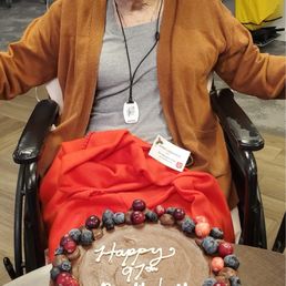 My grandma with her gluten and dairy free cake from Cakabakery!