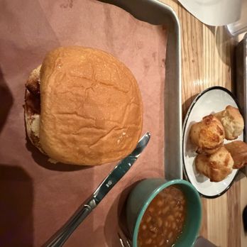 Jim 'N Nick's Bar-B-Q - Pulled Pork with baked beans and cheddar rolls - Barbeque Near Me - Augusta, Georgia Jim 'N Nick's Bar-B-Q - Pulled Pork with baked beans and cheddar rolls - Barbeque Near Me - Augusta, Georgia