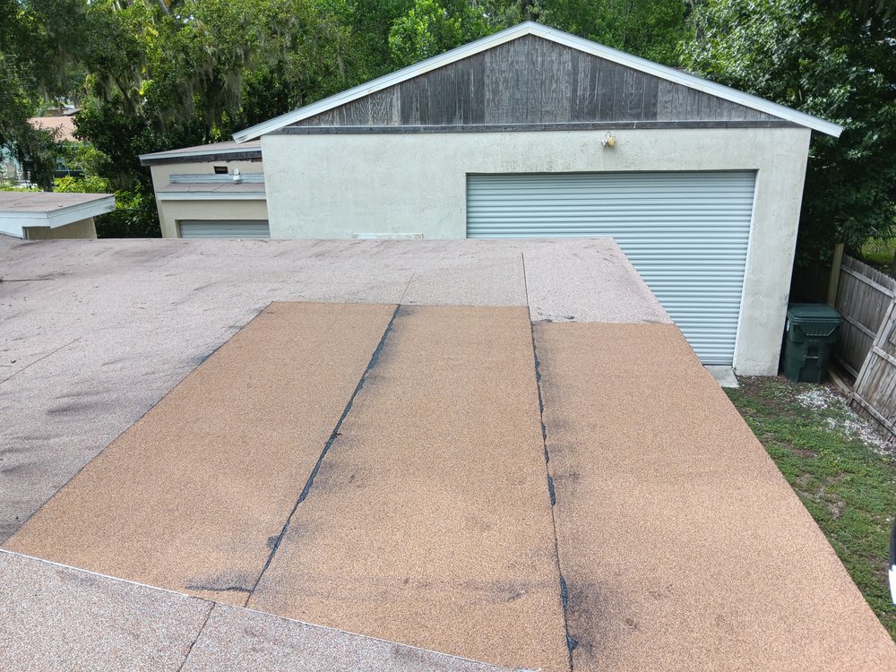 Slide of The Roofing Guys