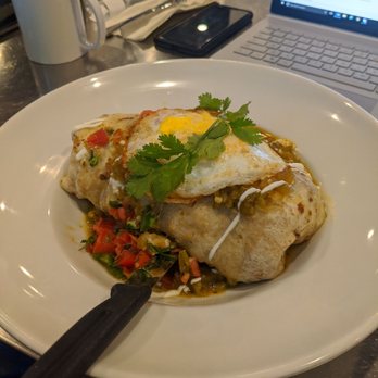 Table 57 - Wet breakfast burrito - so yummy and huge! Two people can definitely share it. - Breakfast & Brunch Near Me - Visalia, California Table 57 - Wet breakfast burrito - so yummy and huge! Two people can definitely share it. - Breakfast & Brunch Near Me - Visalia, California
