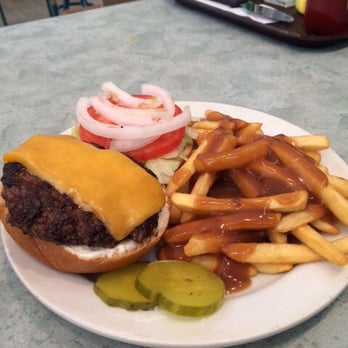 The Kitchen - One Dwayne's home made burgers with fries and gravy of course - Breakfast & Brunch Near Me - Lloydminster, Alberta
