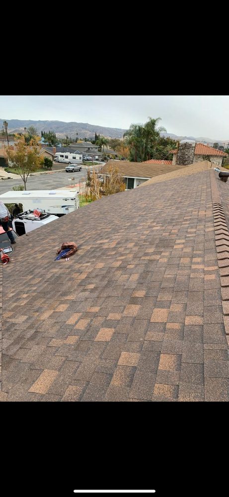 Slide of I Can Roofing